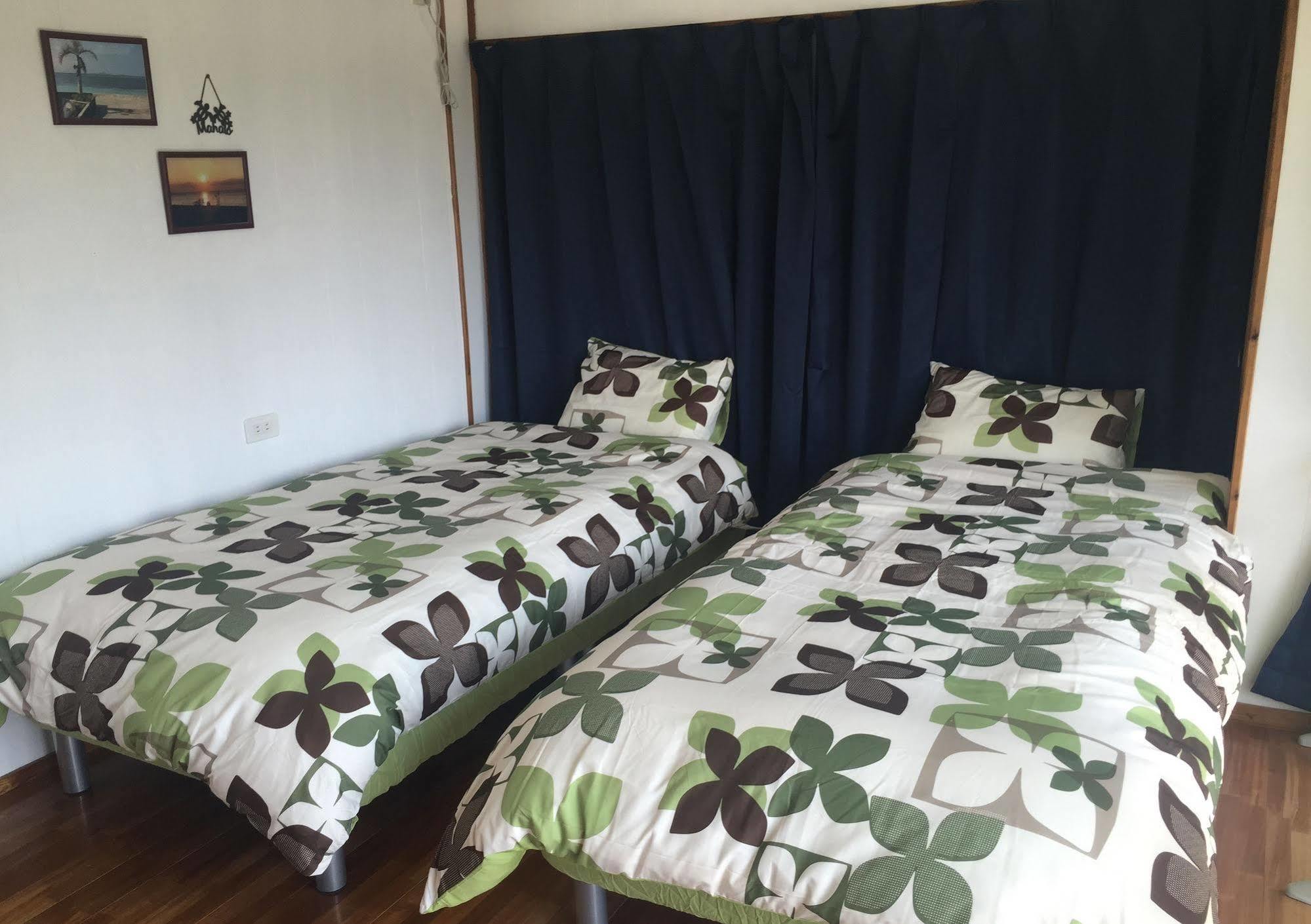 Guesthouse Seagull Village Motobu Bagian luar foto